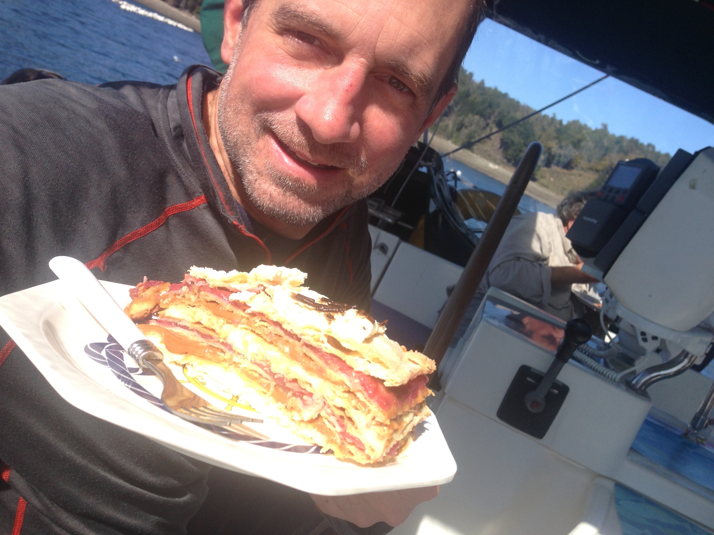 We had a couple of barbecues on the boat with fabulous carne and sides (thanks Christian, Lali, David, and Kata). One in the evening, accompanied by wine and Christian's singing. One in the afternoon, as we baked in the warm sun (at last)! We topped off each meal with this amazing cake -- some kind of dulce de leche, raspberry, and whip cream layered cake.