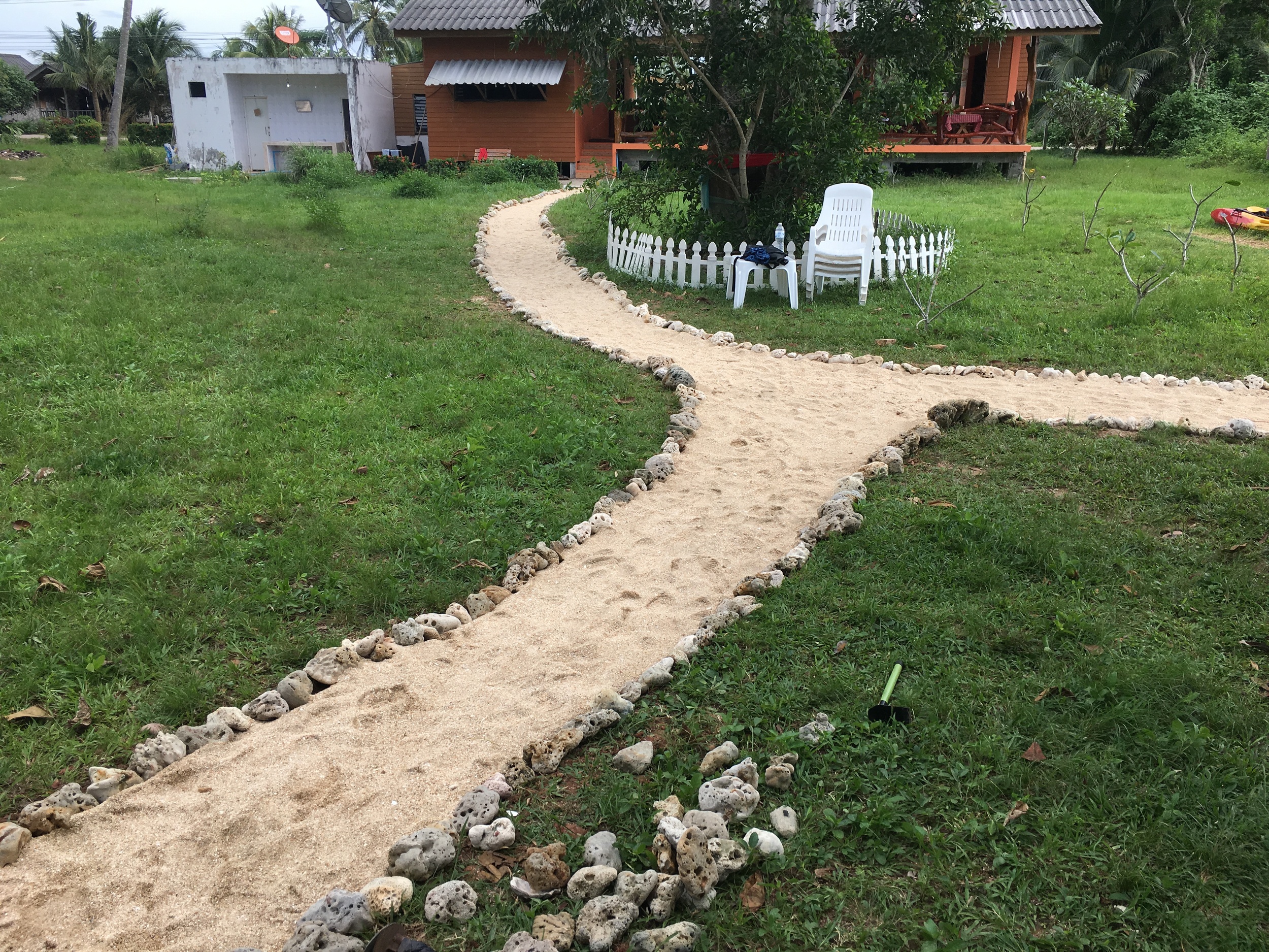 Fork in the road. The path between restaurant, beach, and bar.