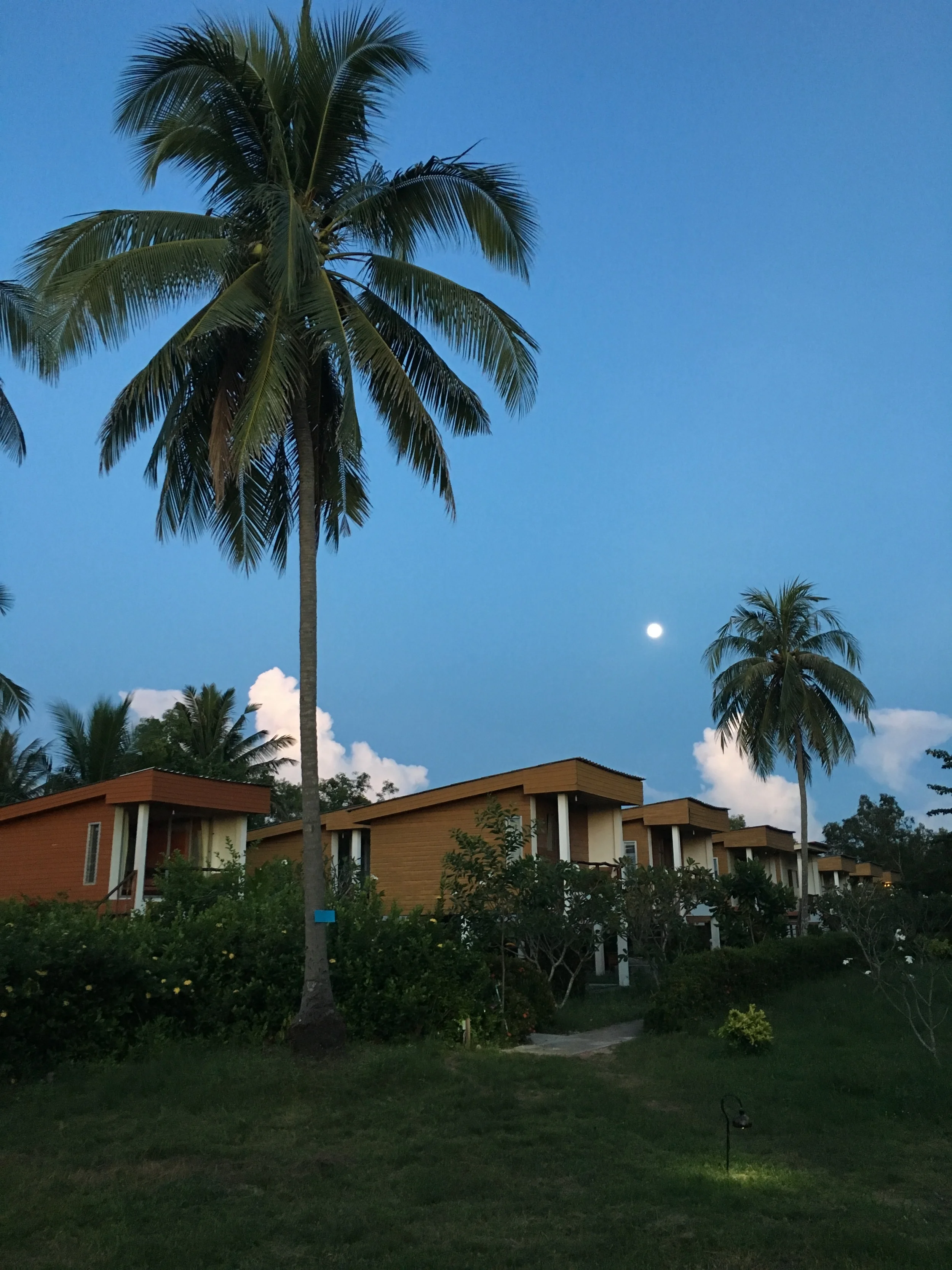 I moved into one of these bungalows. Built on stilts, with wood plank flooring and no hot water, these bungalows provide a bit more rustic living. This picture was taking at dusk, with the moon rising in the east.