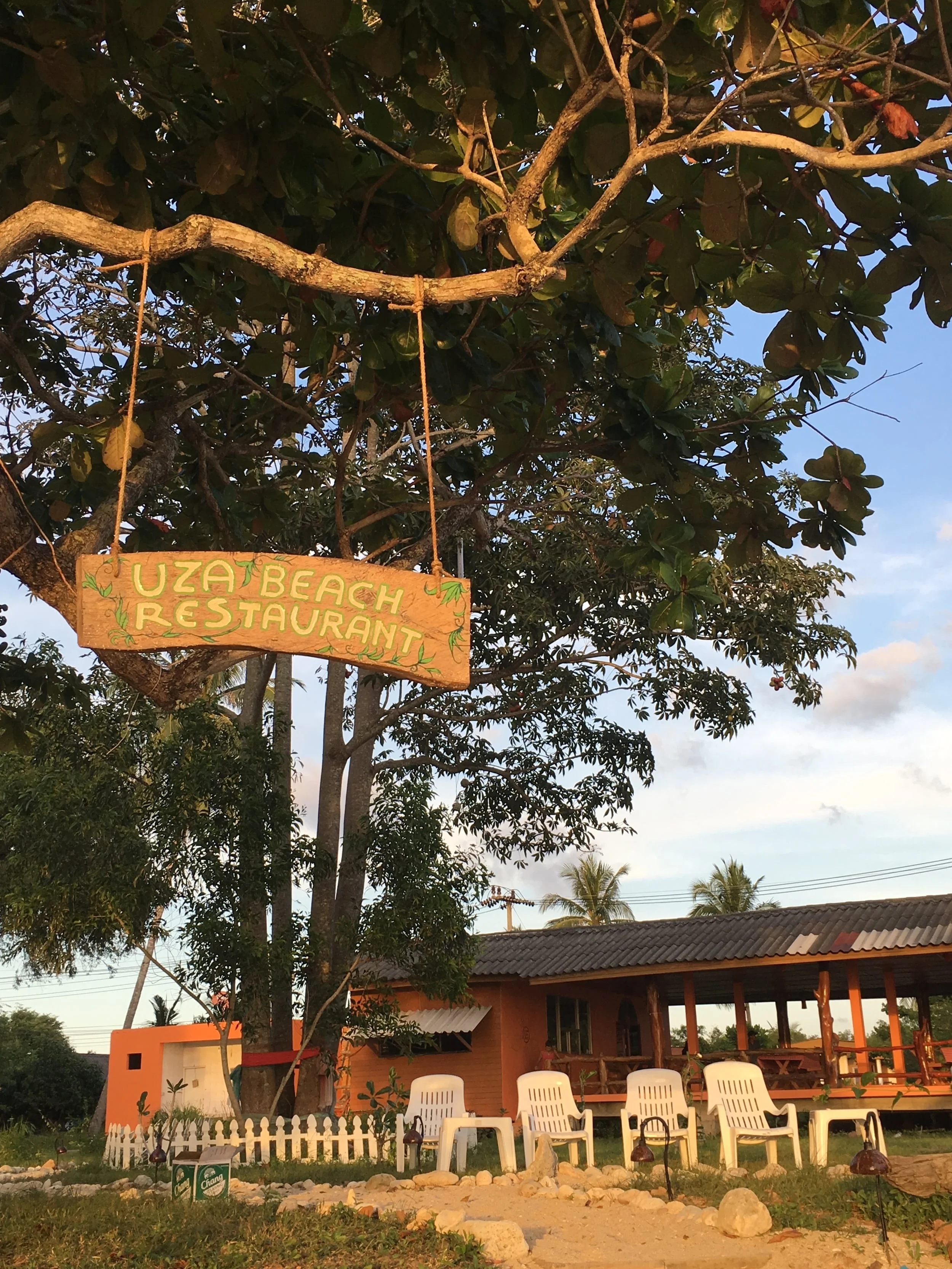 The hanging sign highlighting our restaurant. This picture was taken from the beach.