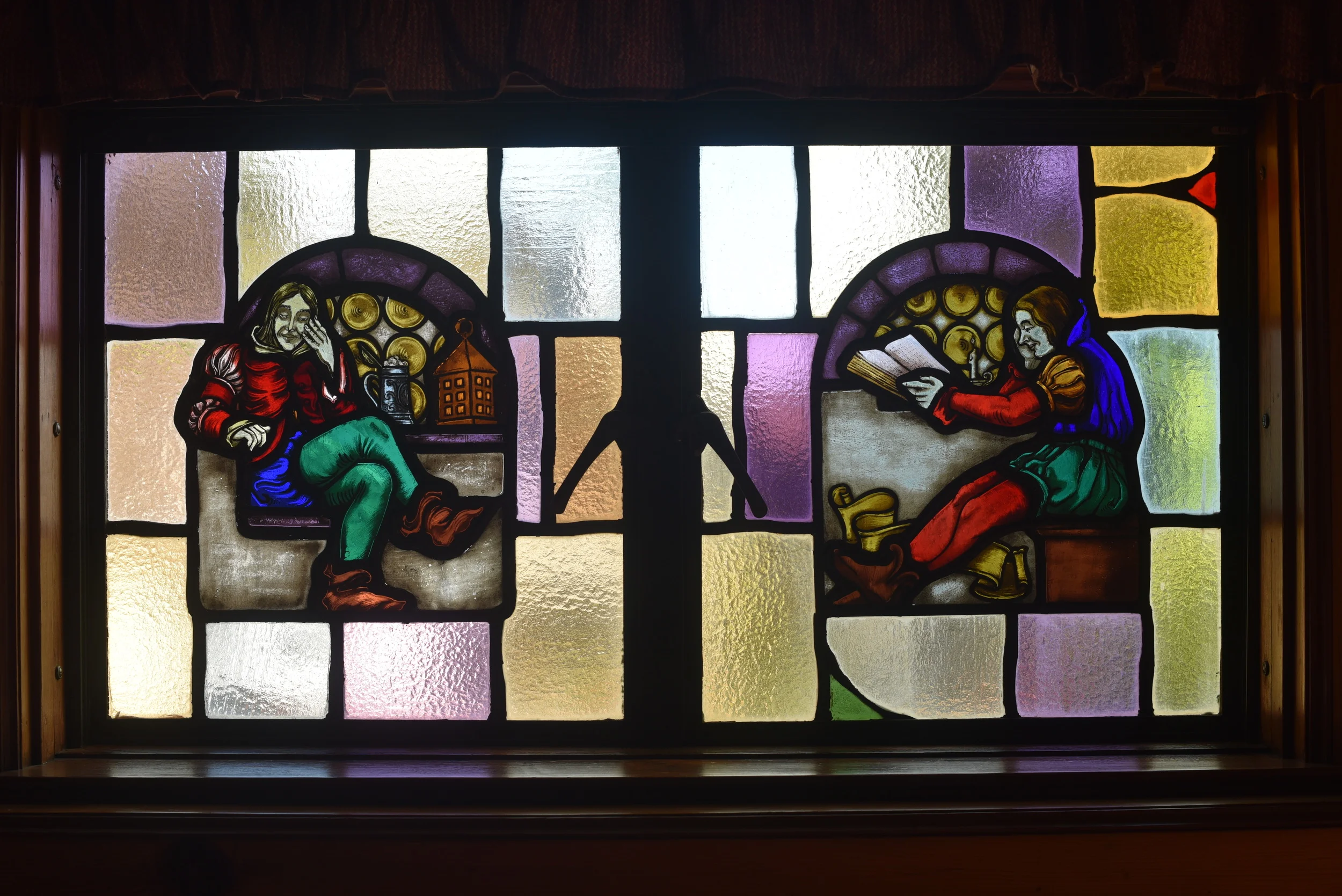 This was the stained glass window in our wood-paneled den, or TV room. The room also had a red light in the left-hand corner and a green light in the right-hand corner. I never really made sense of this until now -- after 4 years of sailing -- these are nautical "running lights." Red is left, port side. Green is right, starboard side. All these years later, I see these hints about sailing that were right in front of me for 18 years living in this house!
