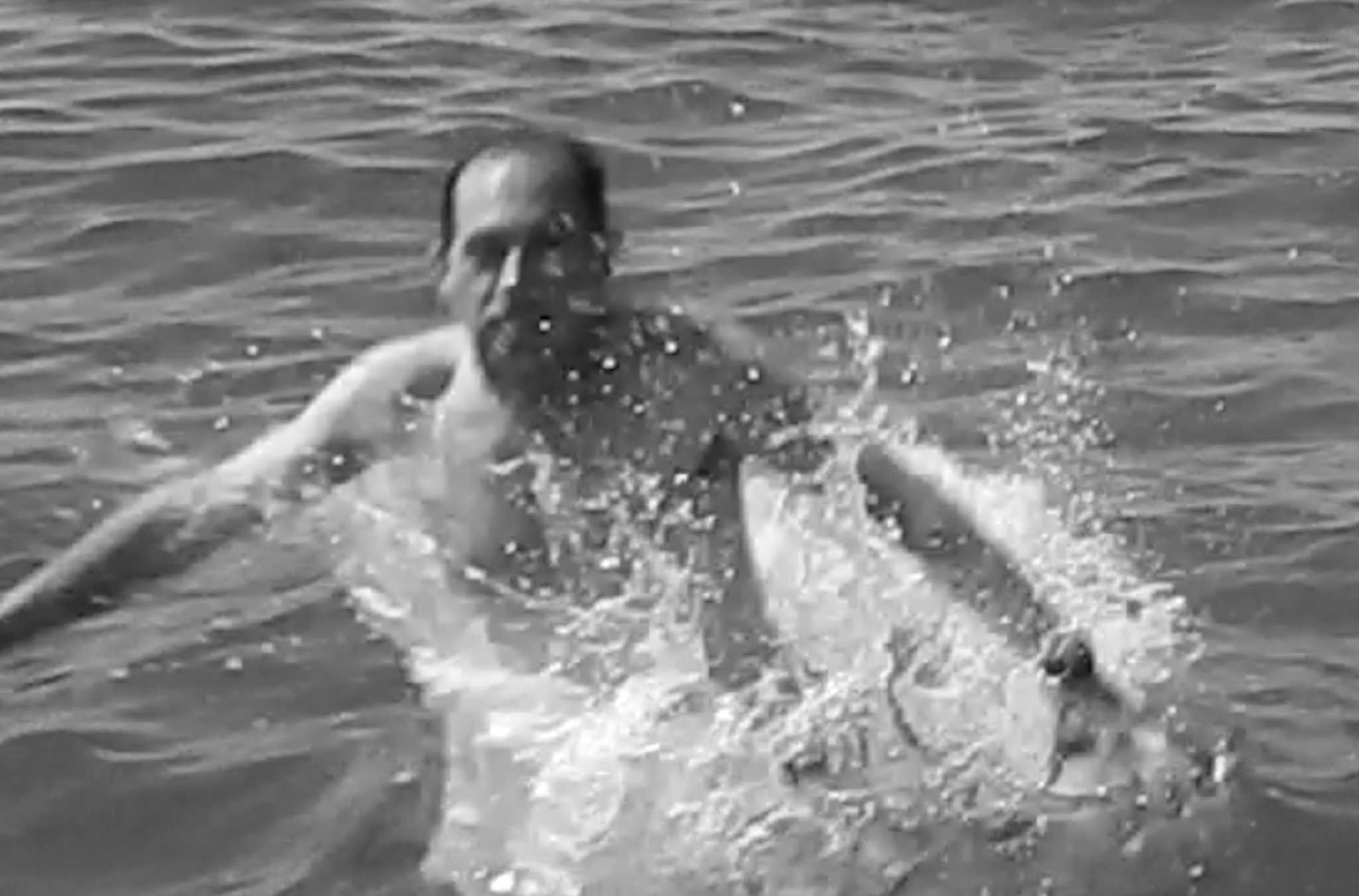 Facial expression as I hit the cold, salty water for the first time.