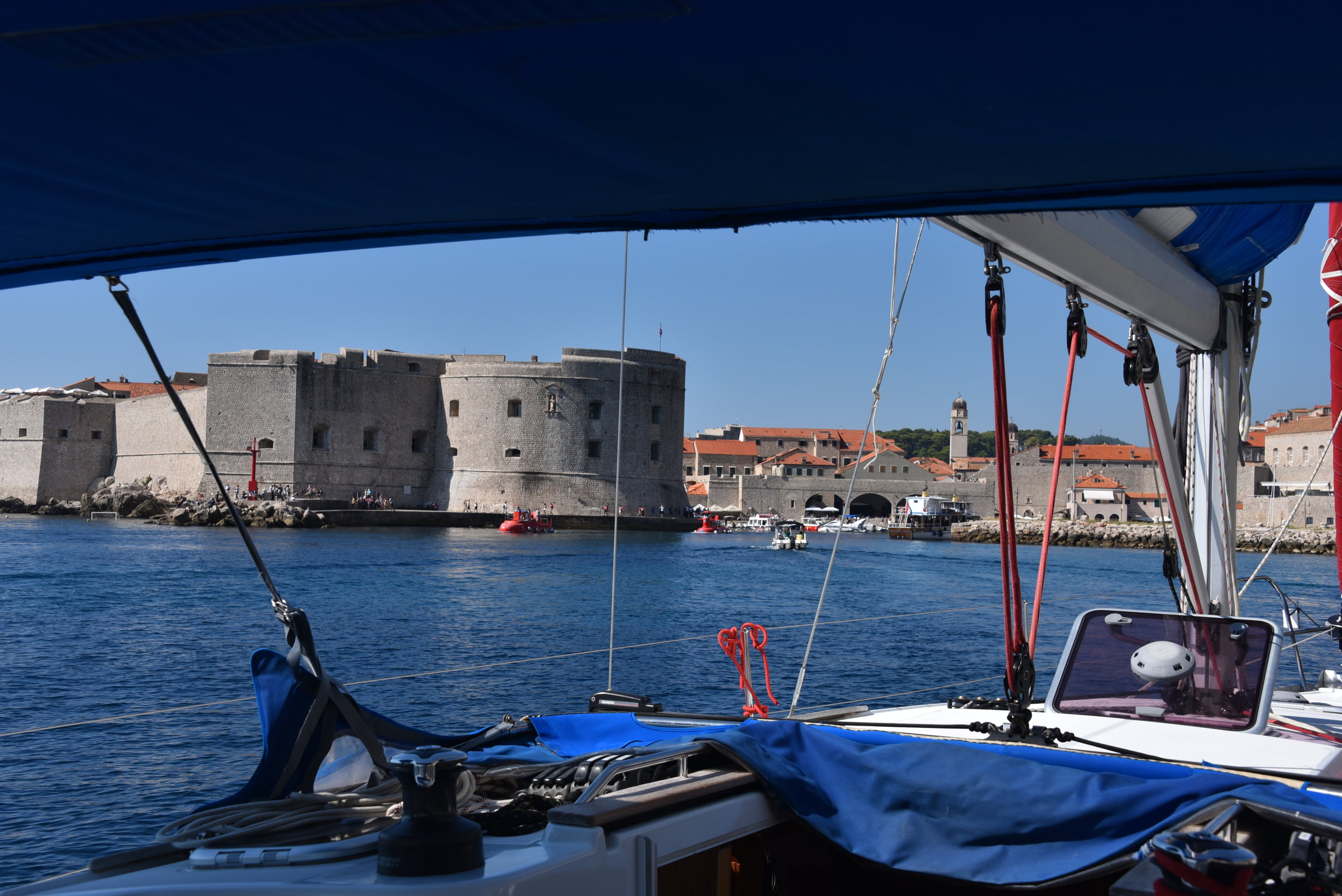 Peeking into the small but very busy harbor inside the walls.