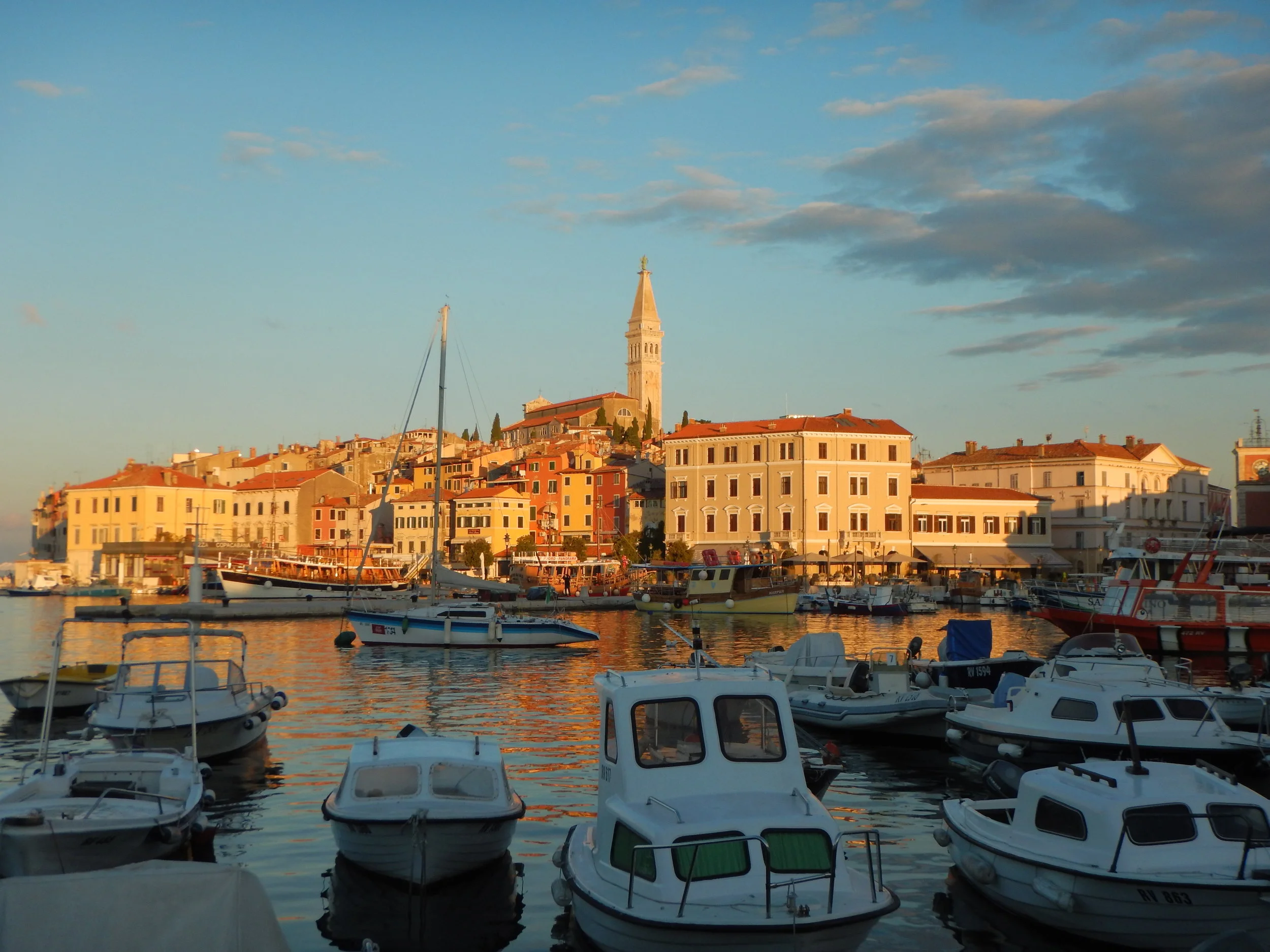 Rovinj at sunrise, with the Church of St. Euphemia towering above all.