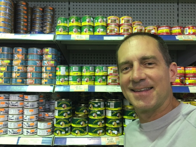Provisioning at the local supermarket. We're going with a lot of canned goods - tuna, corned beef, beans - to minimize risk of spoilage in this heat. Also resorting to classics of peanut butter and jelly, pasta and pesto, and granola bars.