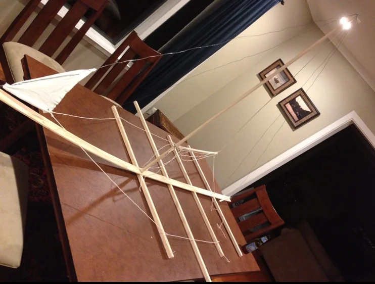 It all began in 2013 with this model of a J24 keelboat made out of wood, string, and wire so that I could practice maneuvers and commands.