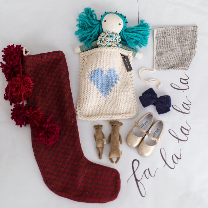 Styling by Mari Spiker, stocking by Tinsel, handmade bears by Commonfolk, handmade gold mary jane shoes by Zimmerman, soft bonnet by Petite Soul, doll found at The Land of Nod, doll blanket by Yarning Made, and wool bow by Wun Way. 