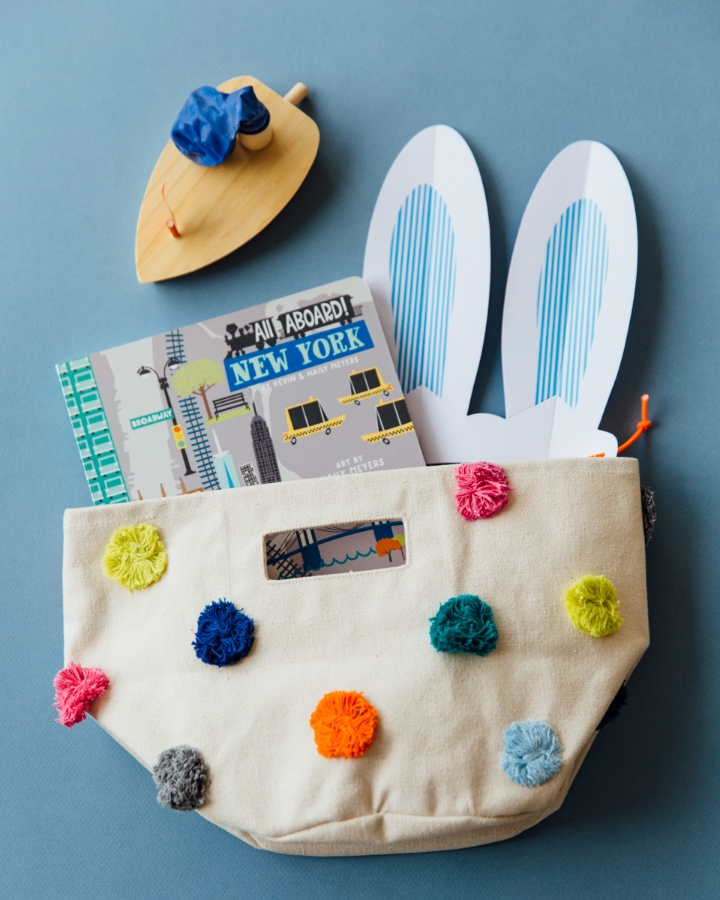 Pom Pom Canvas Bag, Paper Bunny Ears, and Book all from Anthropologie , Boat from Fawn Shoppe