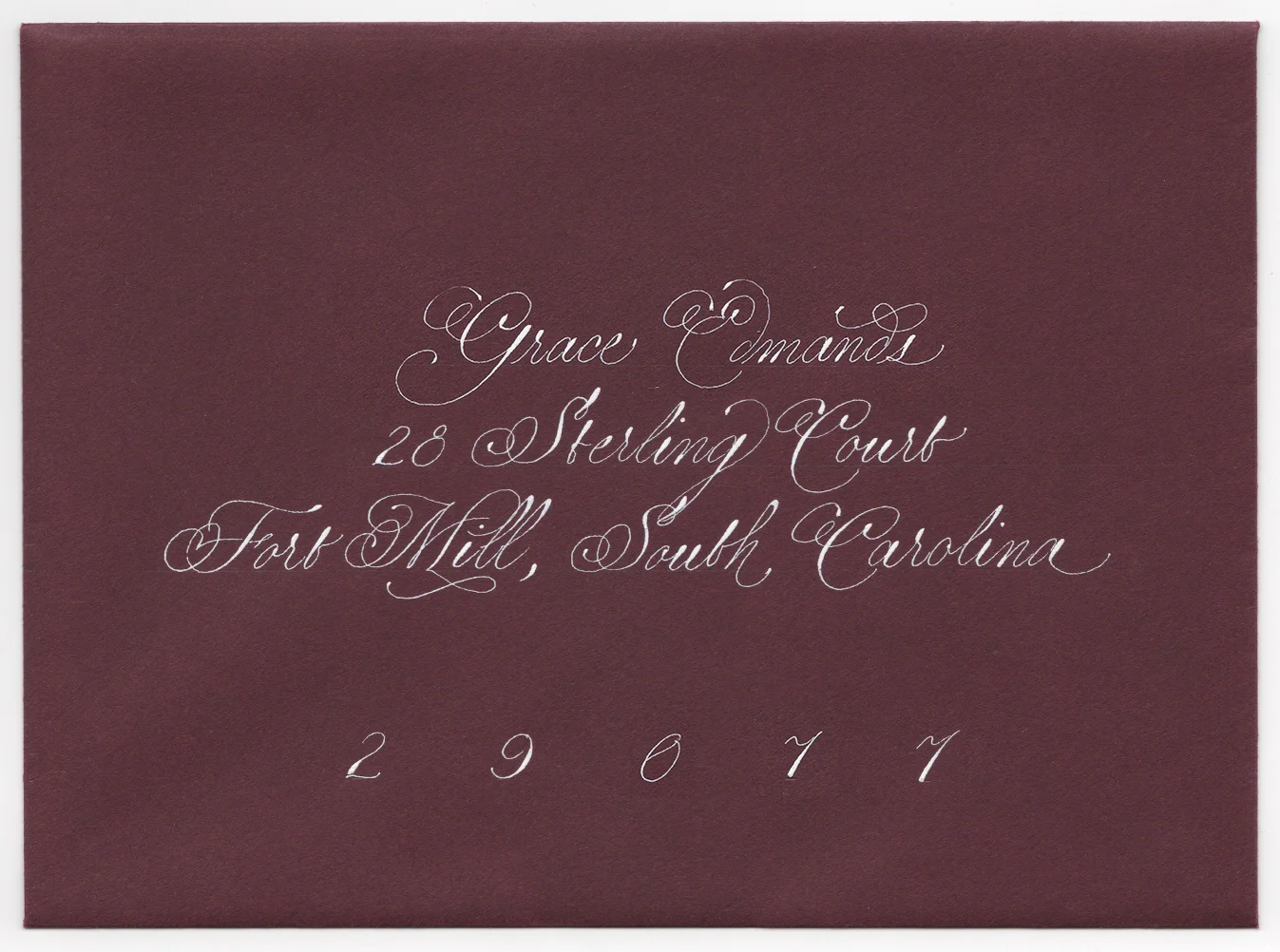 Italian Hand - White on Bordeaux Envelope
