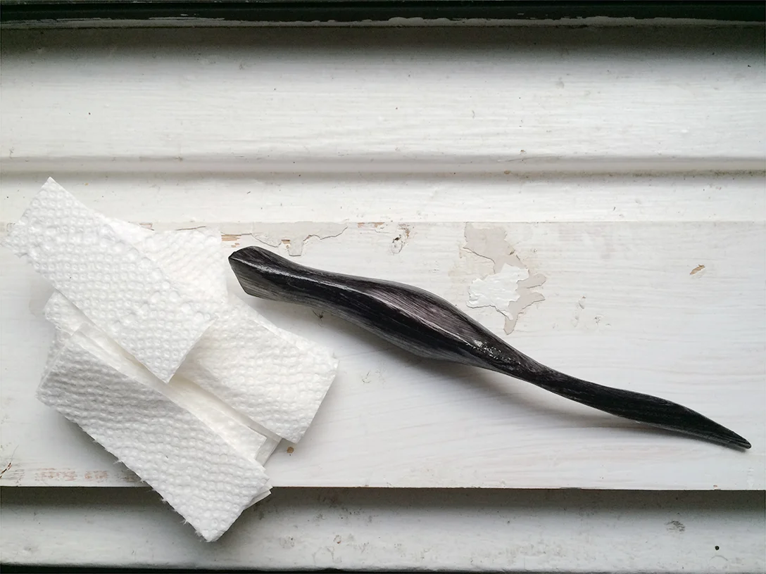 The outer finish is applied to seal the wood and protect it from ink and water