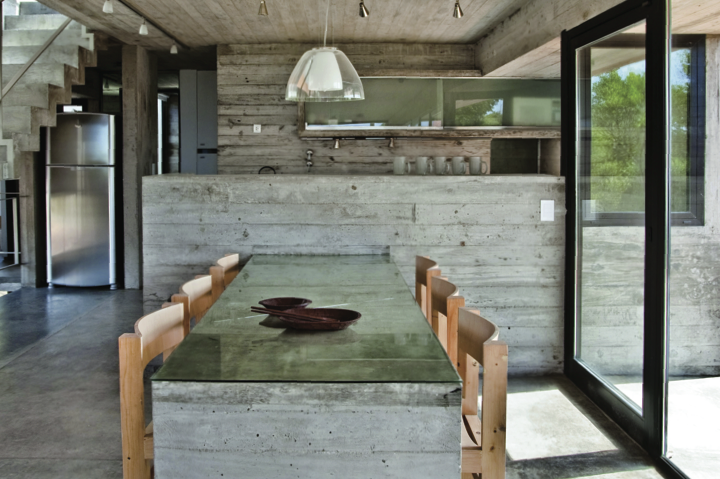 This kitchen is made of concrete and Canadian pine reclaimed from packing crates - Guillerme Morelli