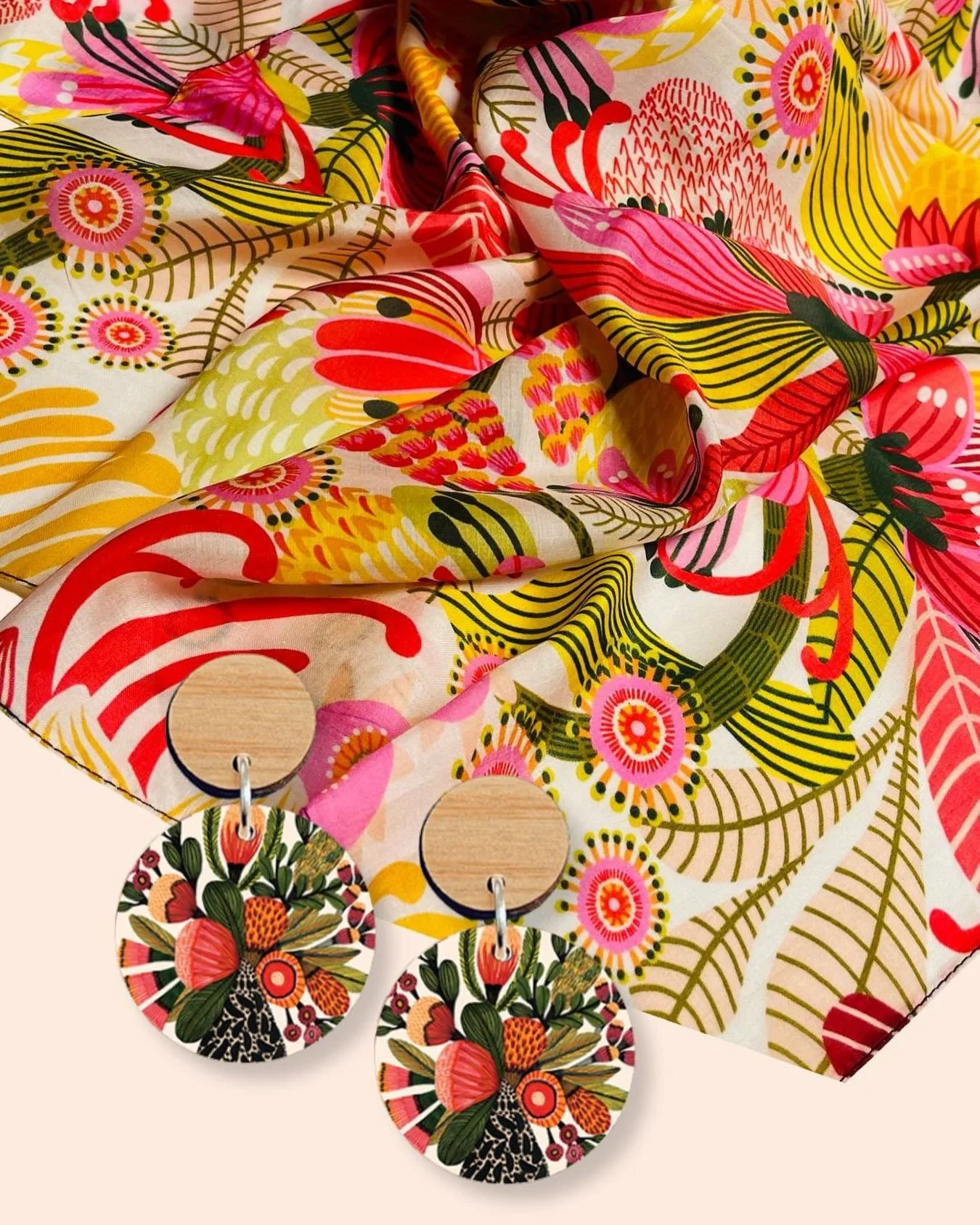 Update your style with a touch of wearable art today! 😃✨ Our stunning designer silk scarves and eco-friendly Australian Eucalyptus wooden earrings are the perfect finishing touches to make your outfit stand out &ndash; vibrant, unique, and oh-so-sty