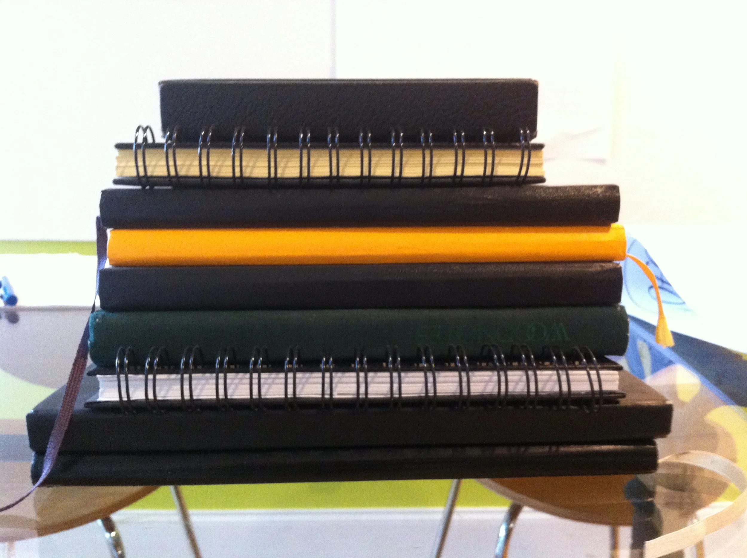 Stack of sketchbooks in the RDA studio