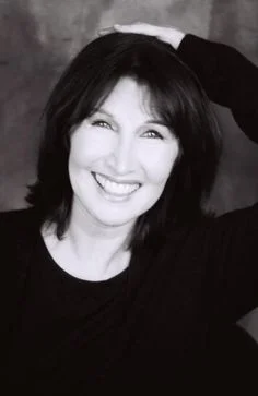 Her celebrity twin, Joanna Gleason.