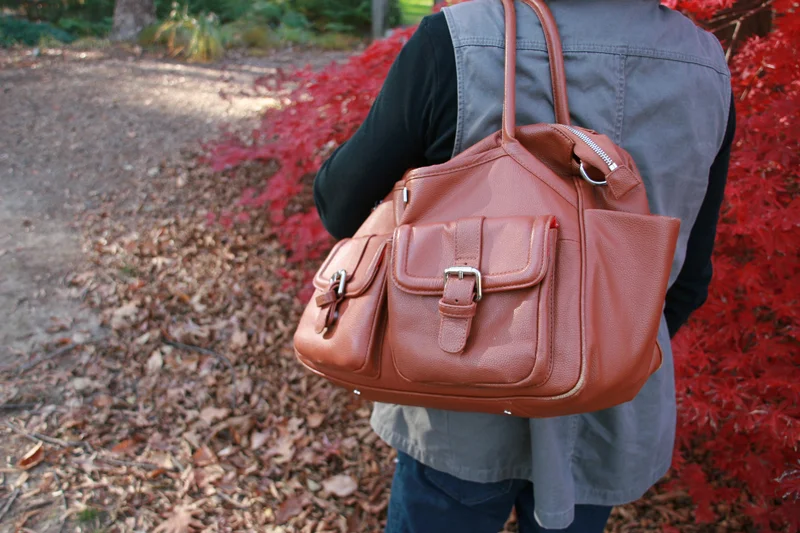 Unclip the big strap, and it's a shoulder bag!