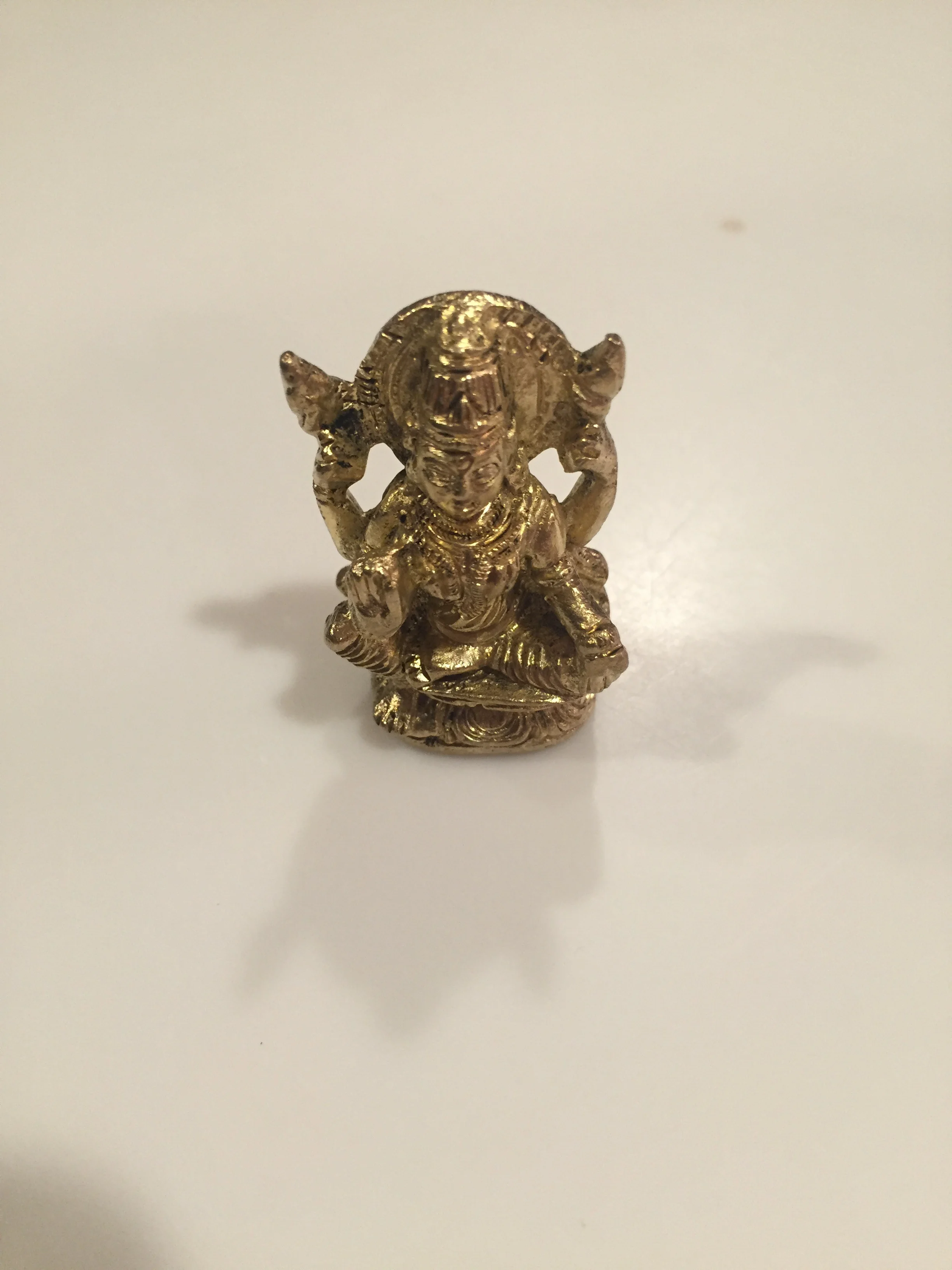 Brass Lakshmi Statue. I have been looking for a brass Lakshimi statue for our Foursee Apparel table. I have looked at several different places and although I have found several, none have spoke to me. It was because this one was destined to be in my box. It has attended two yoga events with me so far and I plan on taking it each time. When it is not on our table it is with Ganesh on his alter at home. Heather found this statue in India and fell in love with it. She actually had to go to several different shops to find enough for the boxes. I am lucky it came to me. 