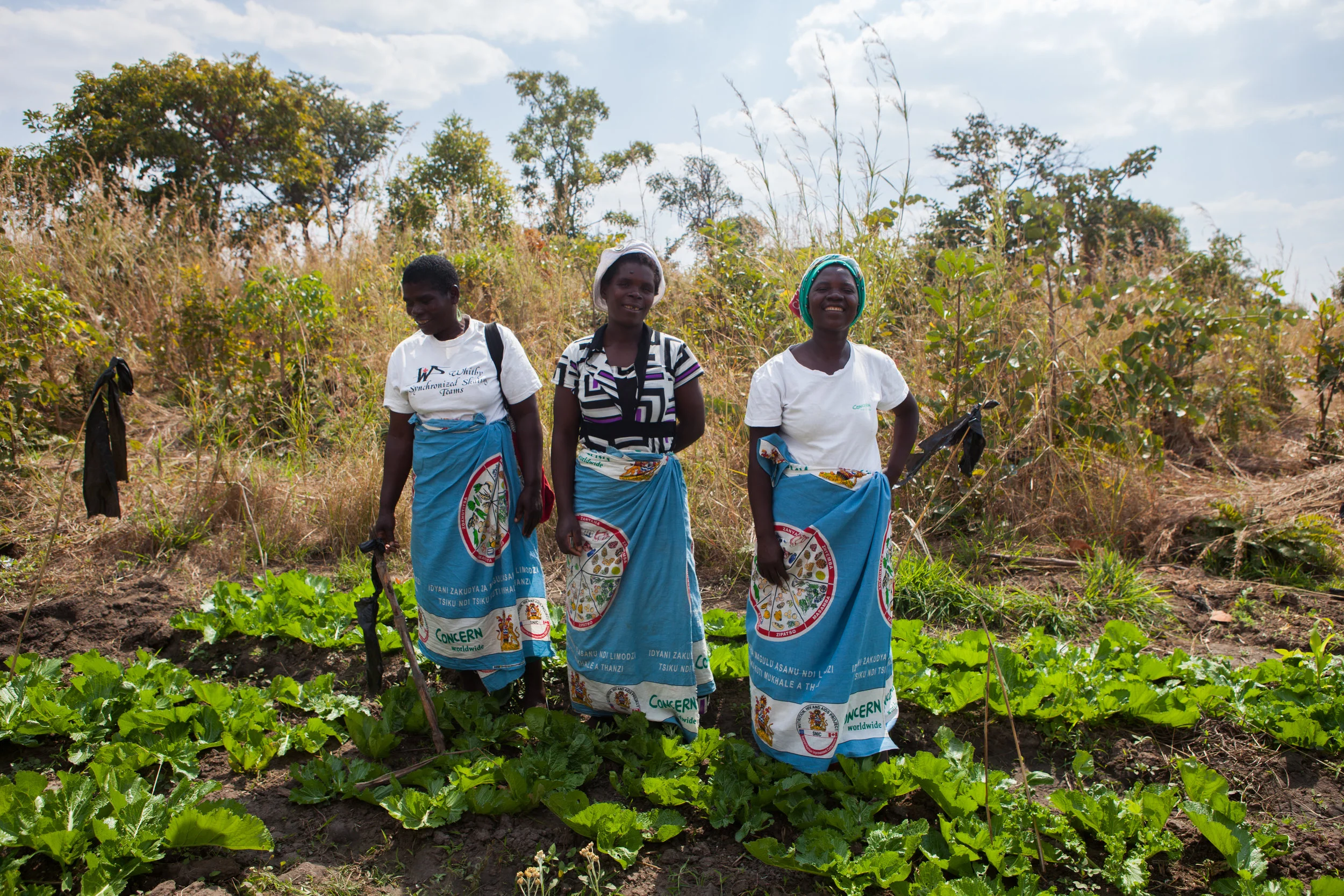 Naomi welcomes us to her farm in Chakale with her friends Rosemarie and Alice