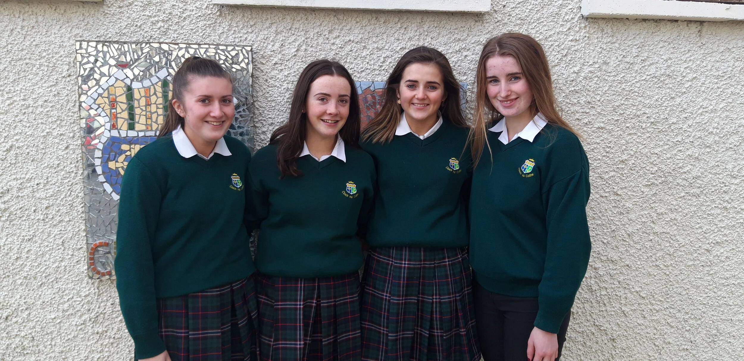 Sacred Heart students receive All Ireland camogie medals.