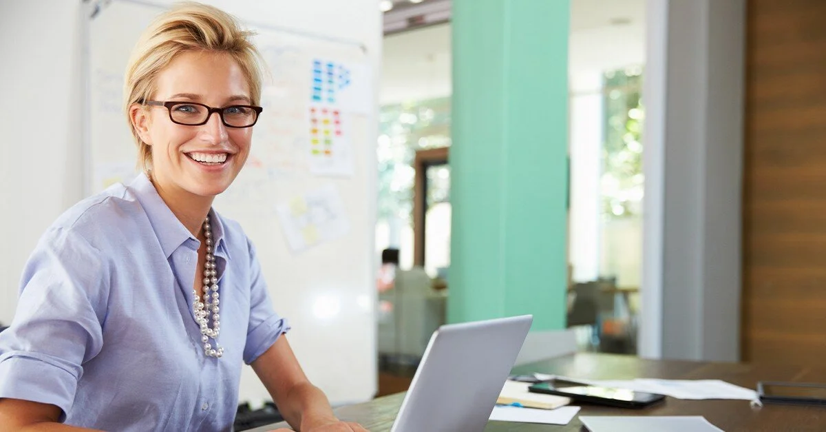 happy woman on computer.jpeg