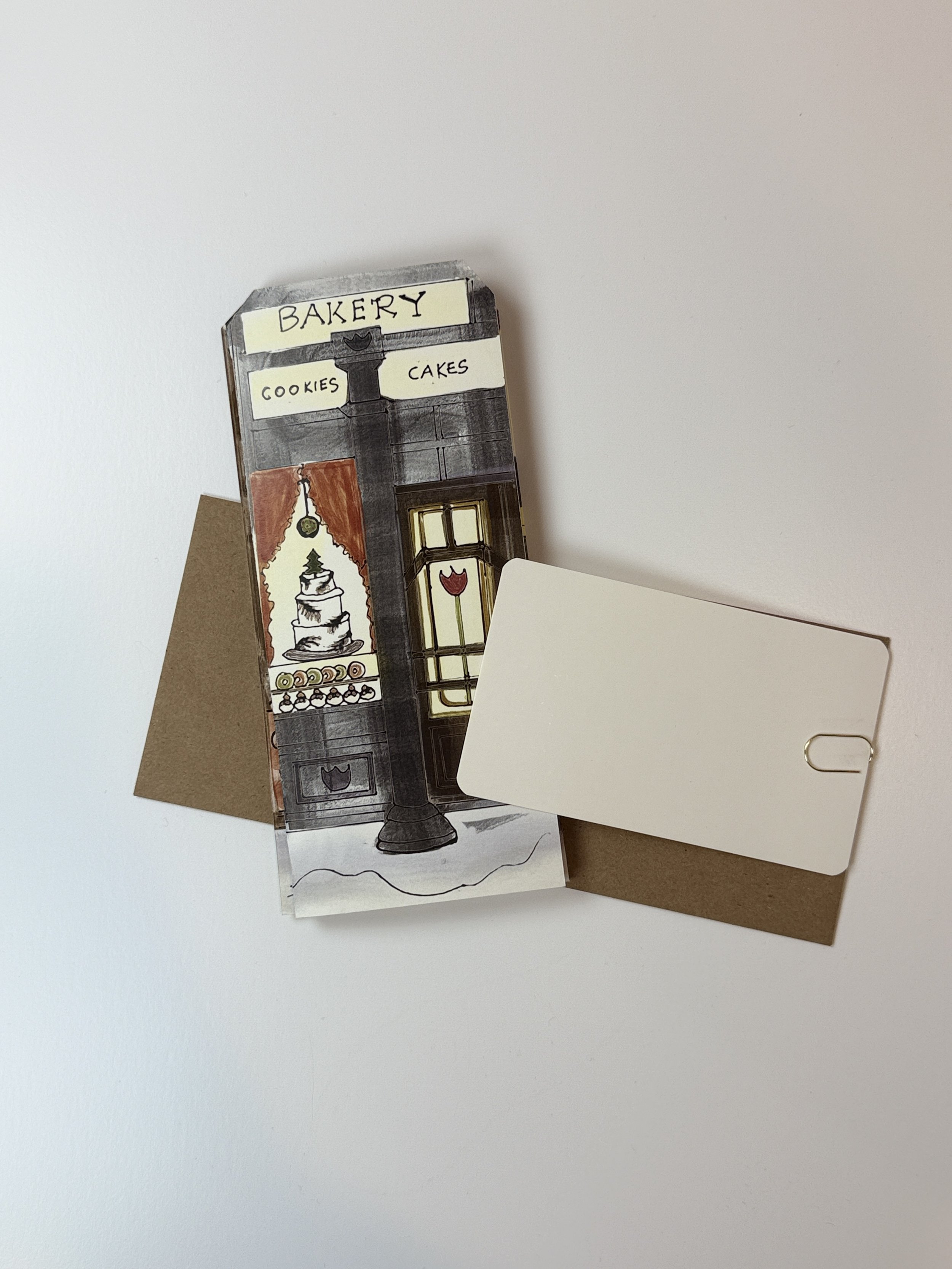vintage Brownstone village cut out card store fronts illustration