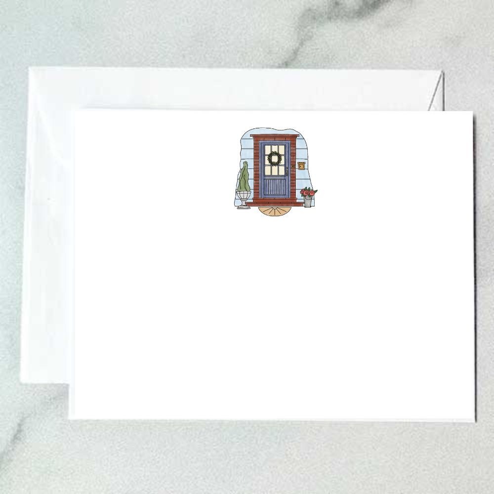 Illustrated wood door note card featuring a blue shiplap door with wreath, potted topiary, and a tin bucket of roses on a welcome mat, designed by Viola and Beatrice Stationers