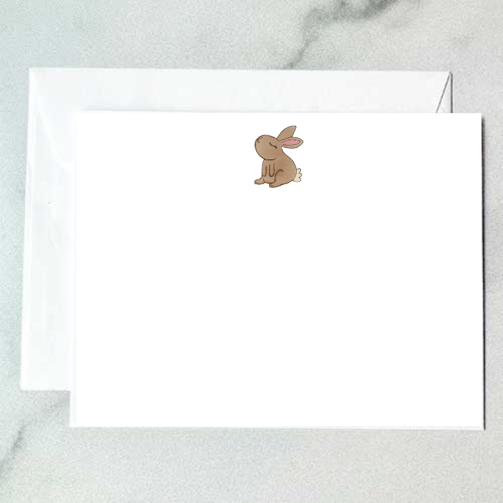 Illustrated brown bunny note card with a round seated cottontail and soft pink ears on a clean white background, designed by Viola and Beatrice Stationers