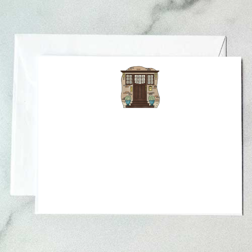Illustrated stone door note card with Craftsman-style warm wood door, leaded glass sidelights, and blue topiary urns, designed by Viola and Beatrice Stationers