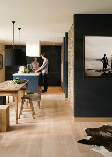 black-kitchen-cabinets-with-oak-floor.jpg