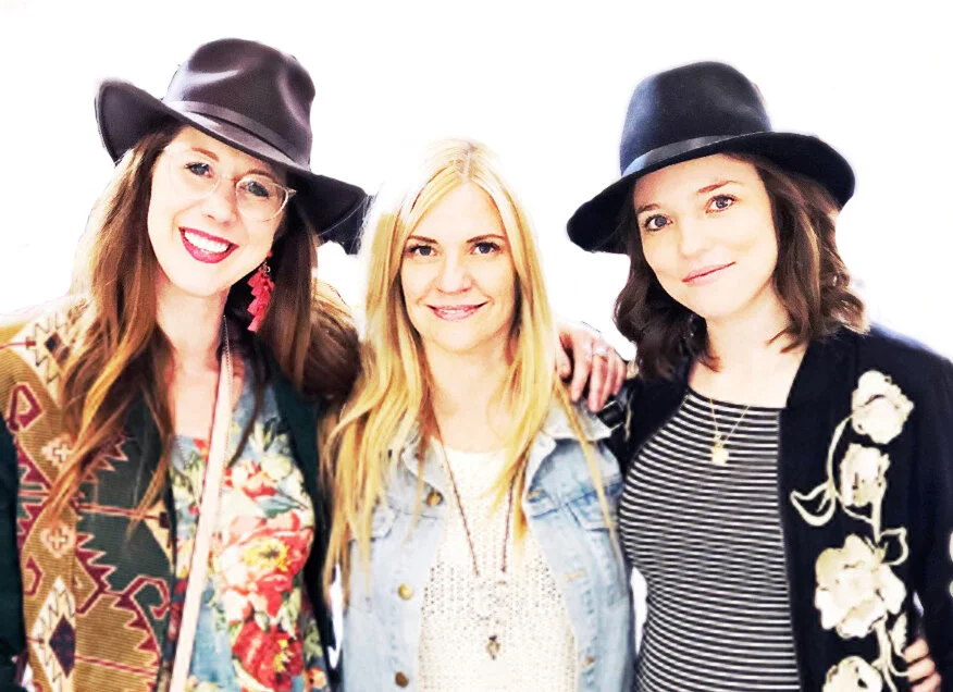 A photo of Colleen McCann of Style Rituals between Andi Scarbrough  of Crown Works and Julie Civiello Polier, the shamanic facialist