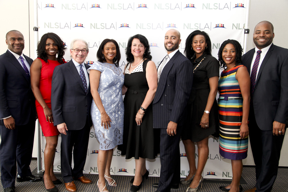 NLSLA Executive Director Neal Dudovitz (3 from L); Kimberly Willis, President Langston Bar (4 from L); NLSLA Deputy Director Yvonne Mariajimenez (5 from L) and John M. Langston Bar Association