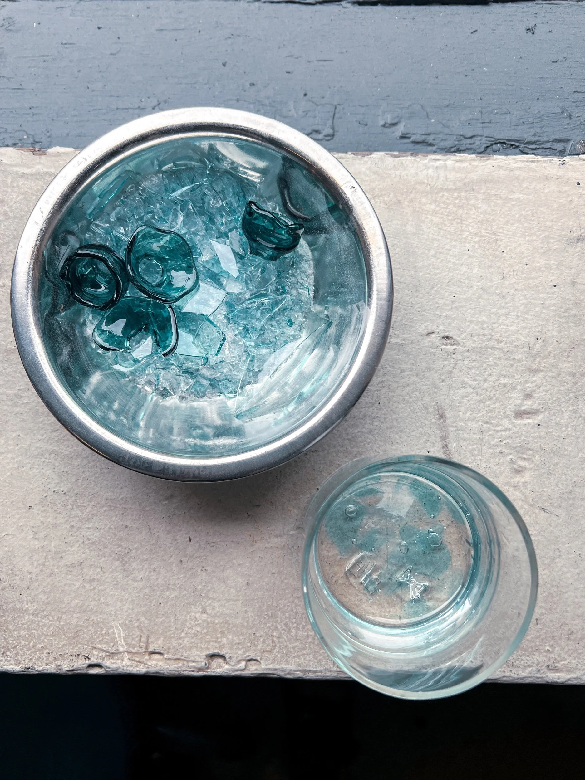 flute glass made of teal recycled glass