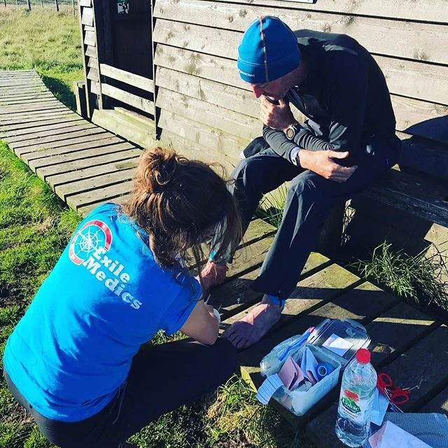 Exile Medics will do whatever they can to get competitors to the finish line! #exilemedics #runningmotivation #foottaping #run #runner #ktape #kinesiologytape #k #runningshoes #montanespinerace