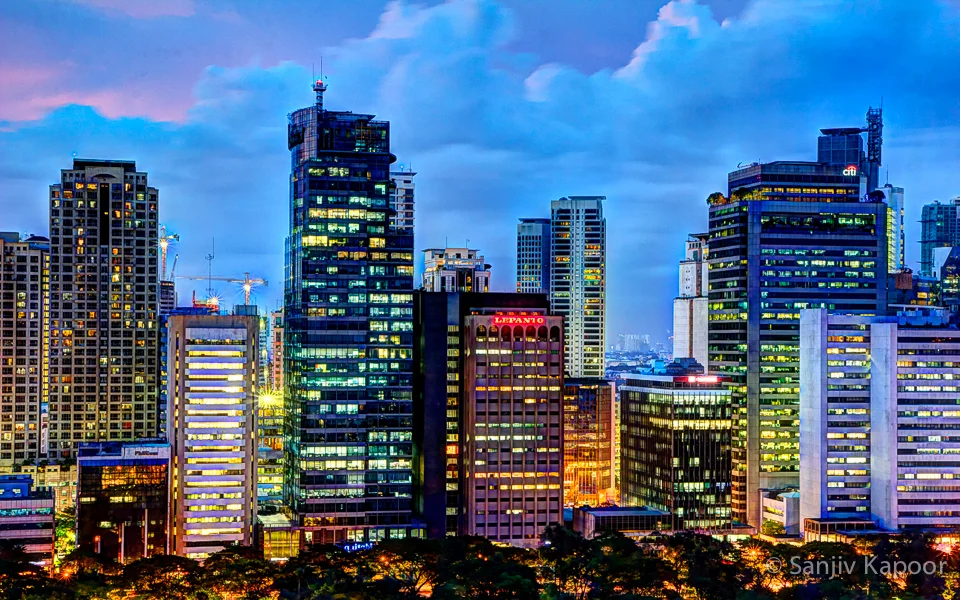 "Towering above the trees"     Manilla, Philippines