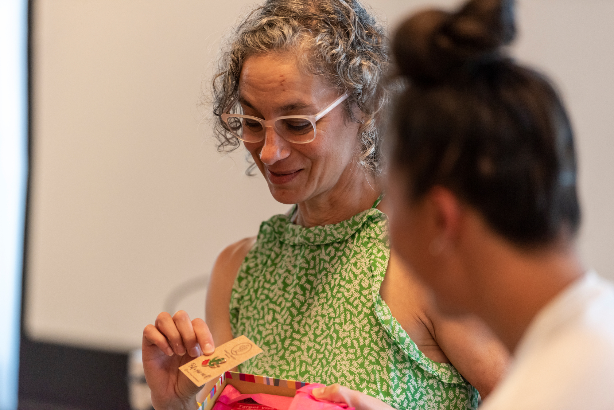 Fran Melmed, Amy’s mentor and our founder, gives Amy her graduation cactus pin