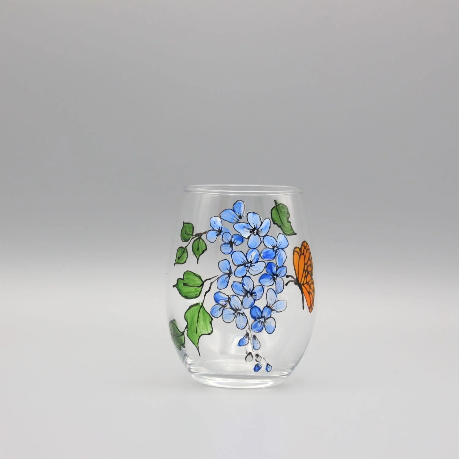 butterfly_and_flower_stemless_wine_glass_blue
