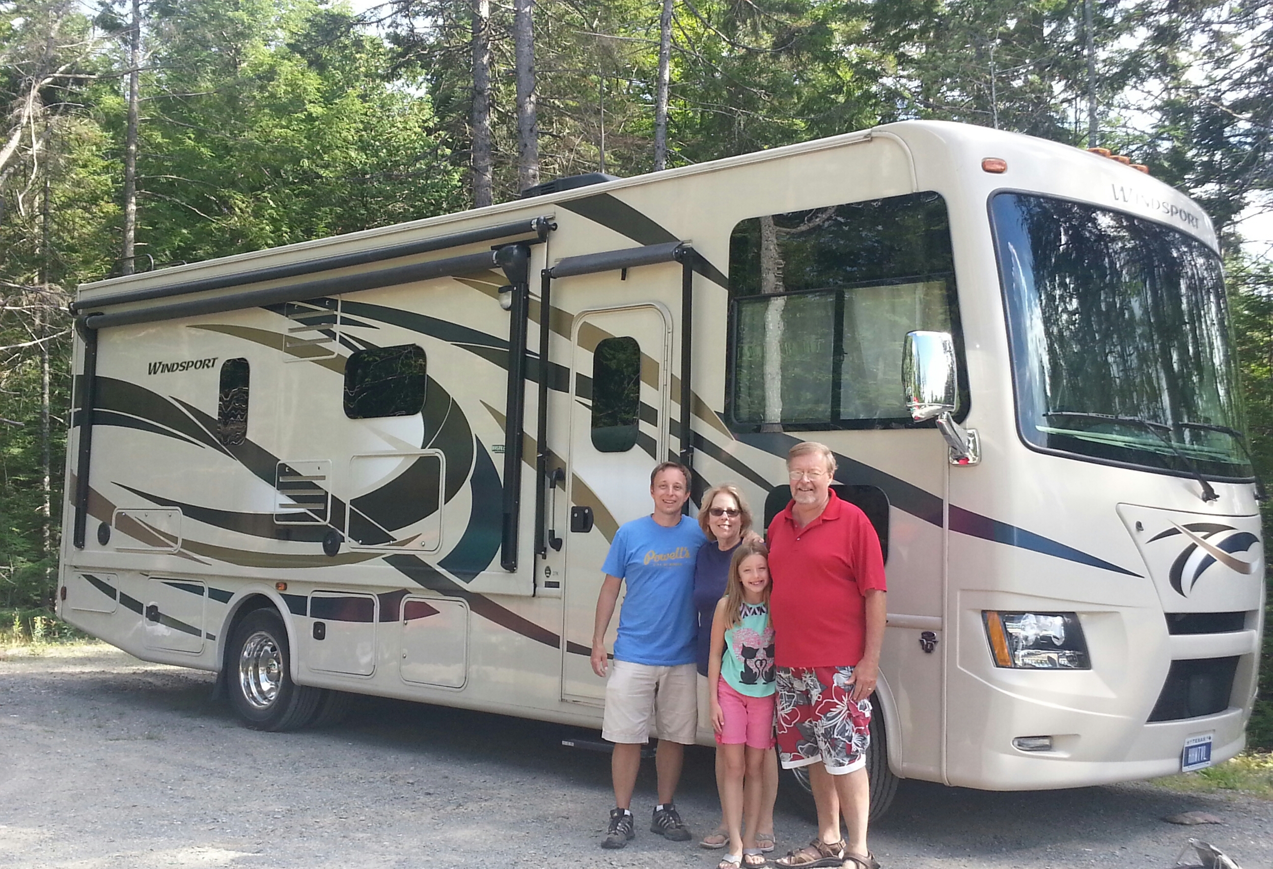 Petunia is standing between her grandparents, who came with us in the RV to take us to lunch in an enchanted setting.