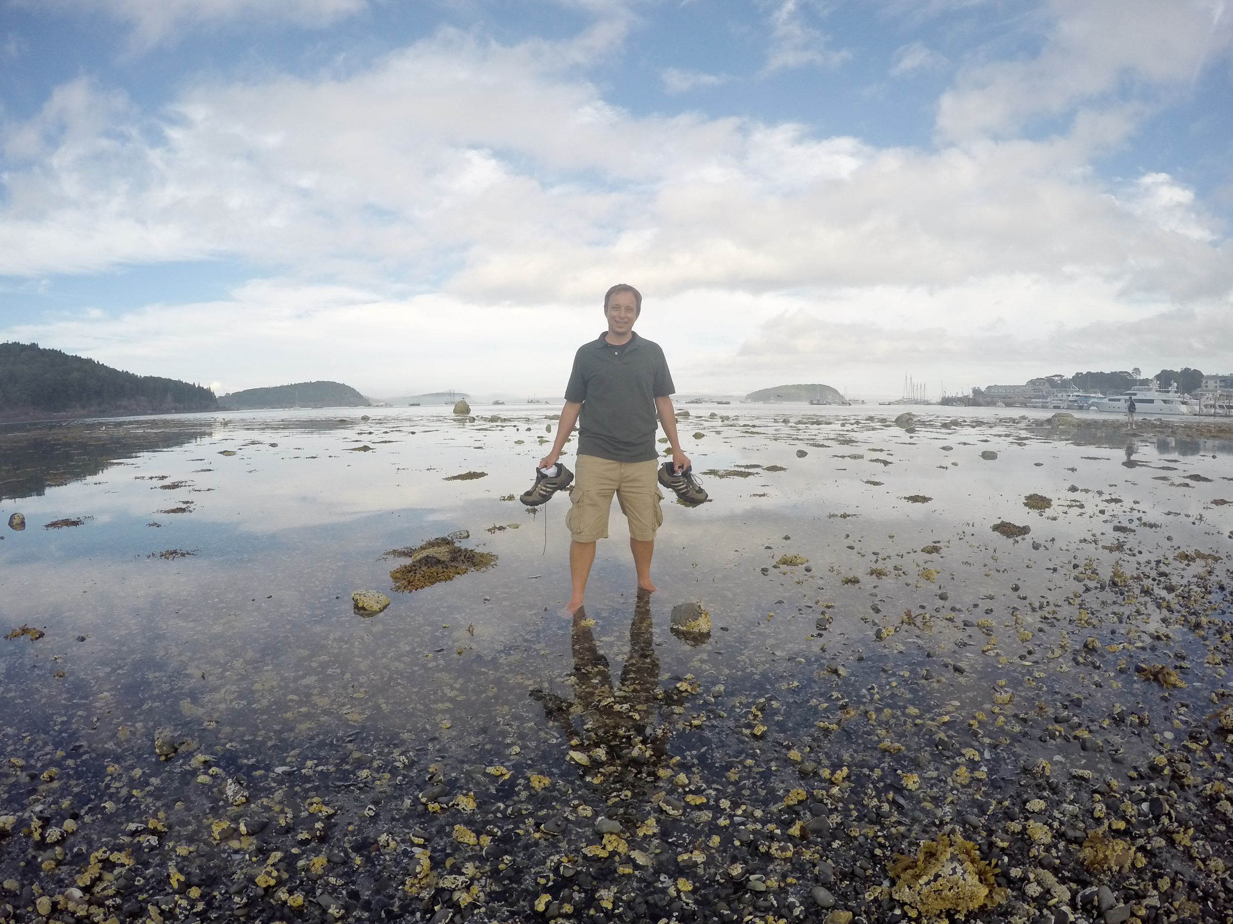 This is what happens when the tide comes back in so unexpectedly fast. Mark had a little dry path to walk out and look at some pools and two minutes later, his path was gone. He had to balance on a rock and take off his shoes so they wouldn't get soaked.