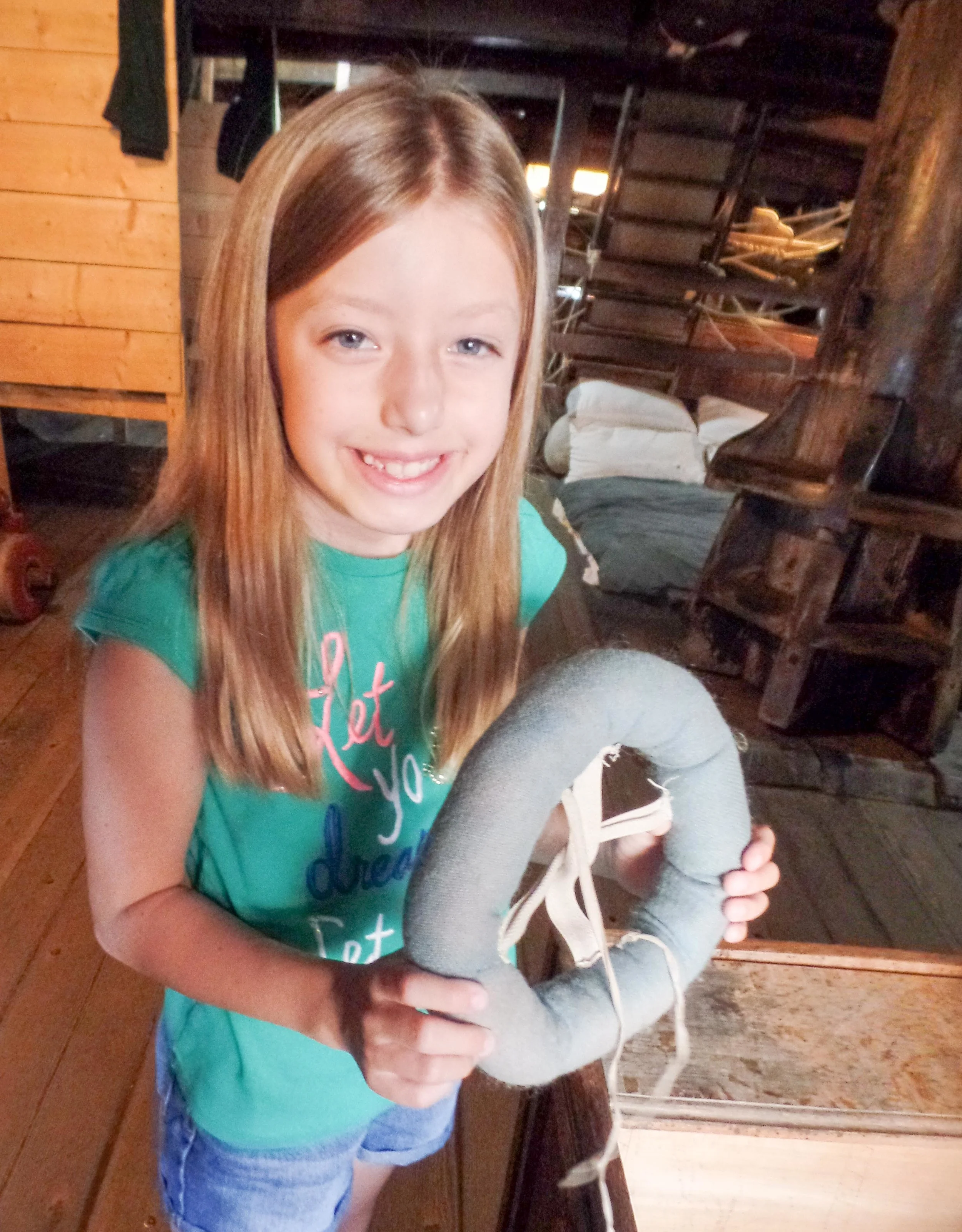For example, Petunia found this curious object and asked what it was. We learned that they tied these on the heads of any toddlers or small children to keep them from injury when the ship may have led their unsteady legs to a fall or a bump into a sharp corner.