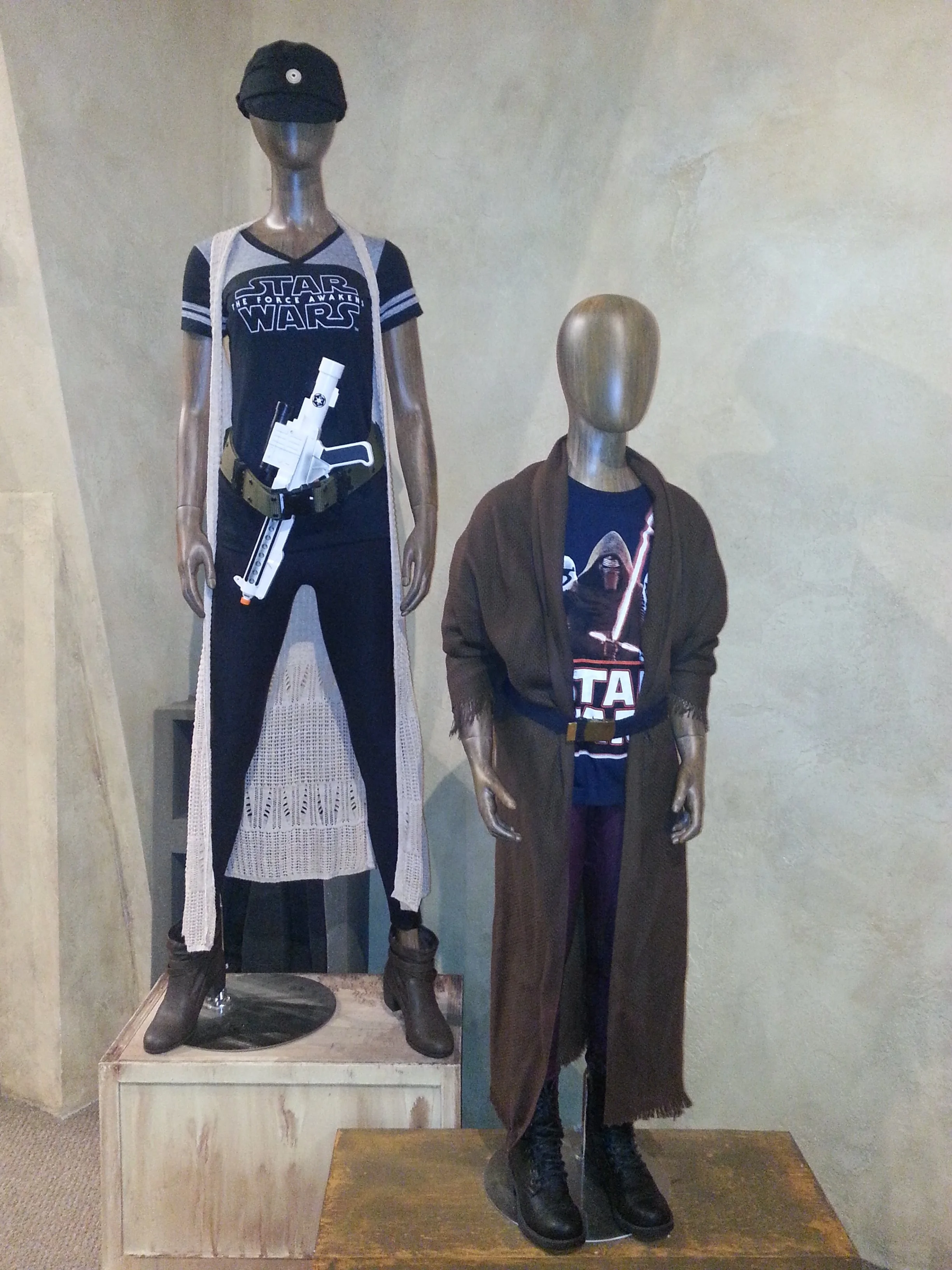 I'm actually kind of digging that outfit on the left.