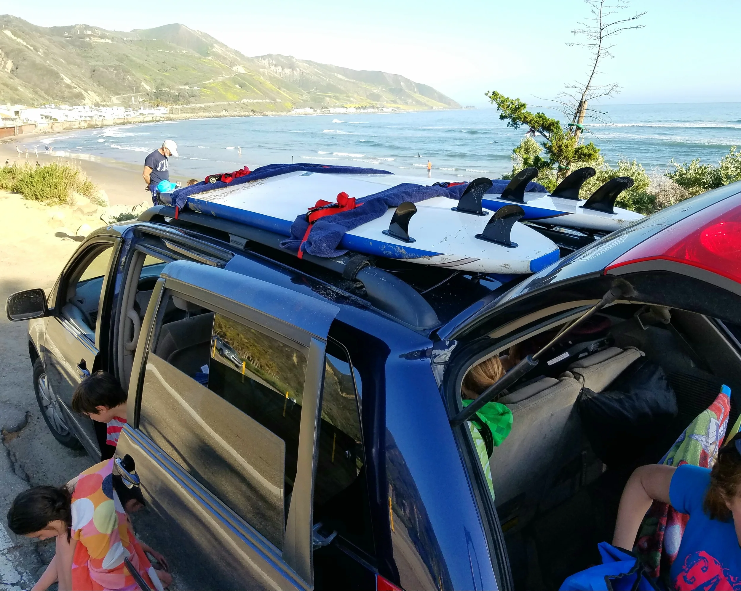 Surfboard-toting, beach-going minivans are cool.