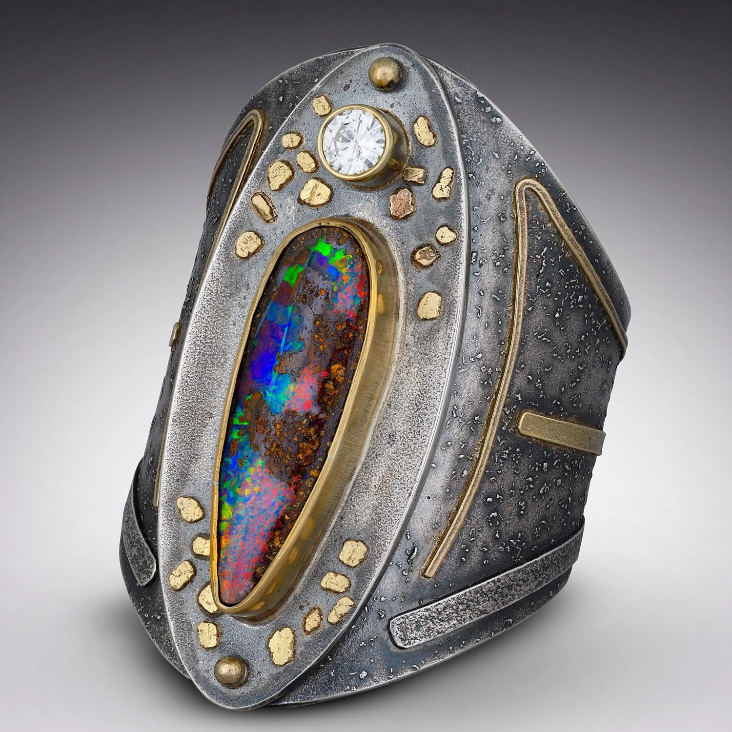 striation-18k-silver-diamond-boulder-opal-ring-angle-view.jpg