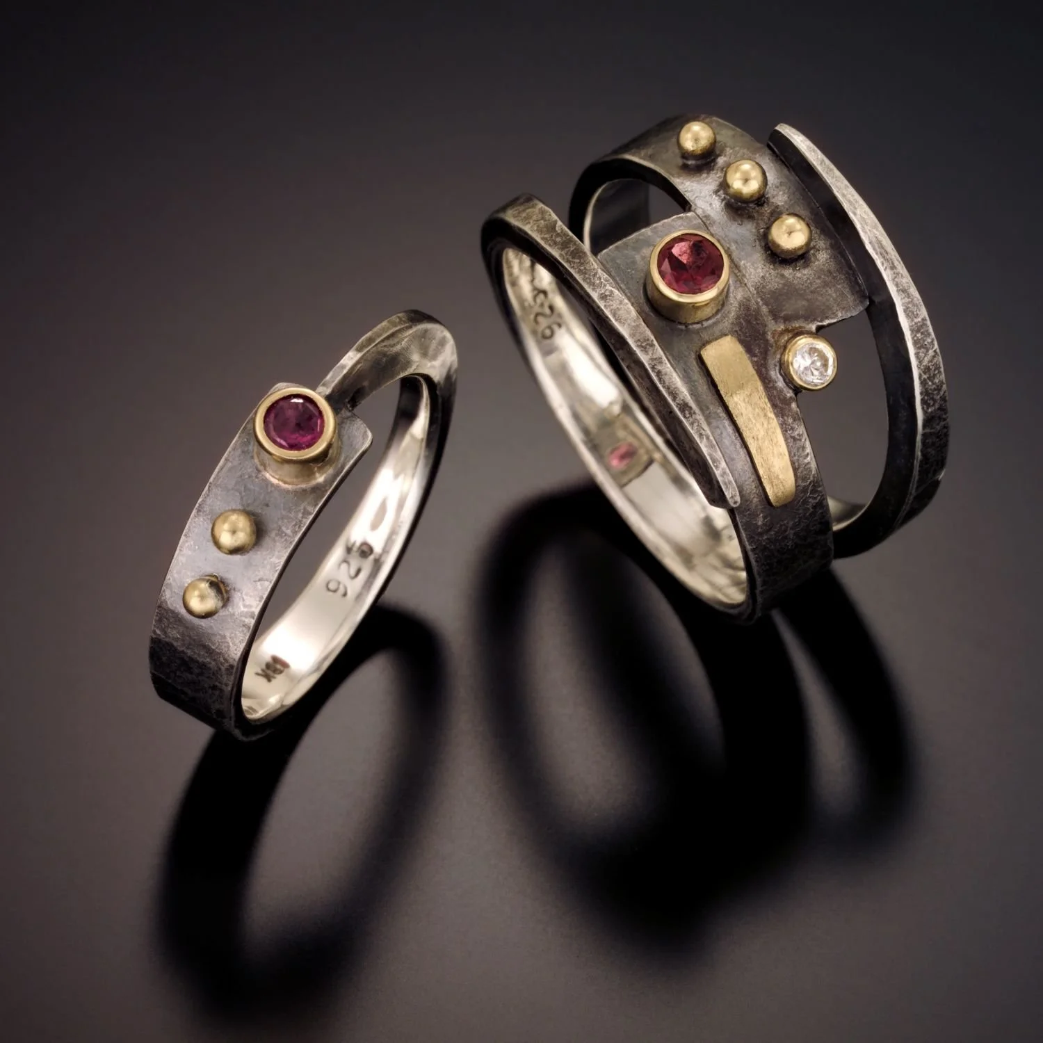 forged-18k-gold-silver-garnets-diamond-ring-angle-view.jpg