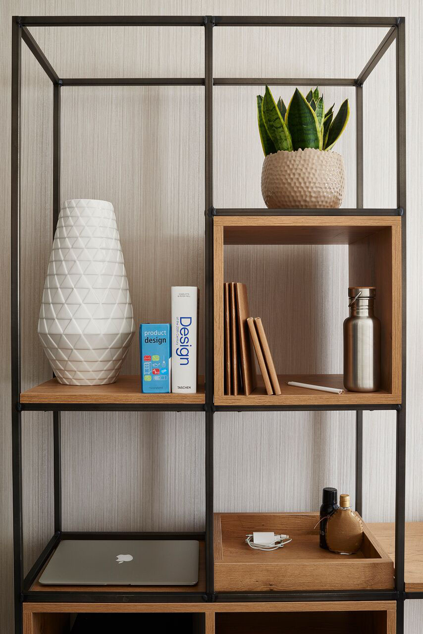 Inspiration cabinet / We put a lot of effort in designing the best cabinet for our guests. The open frame keeps the room spacious while providing sufficient storage space and the integrated 'bowl' helps you to never loose your keys again.