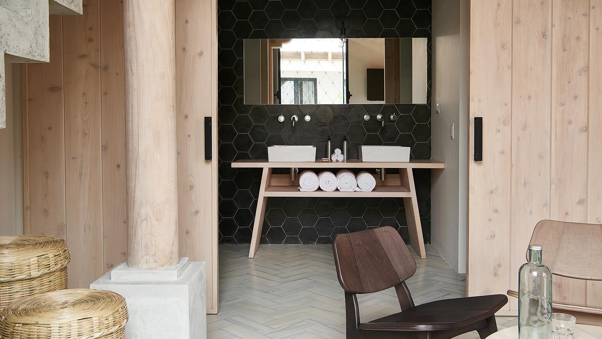 Mezzanine Room / The Mezzanine suites offer a stylish living room with lounge chairs from a local designer and a luxurious bathroom with Guatemalan marble flooring.
