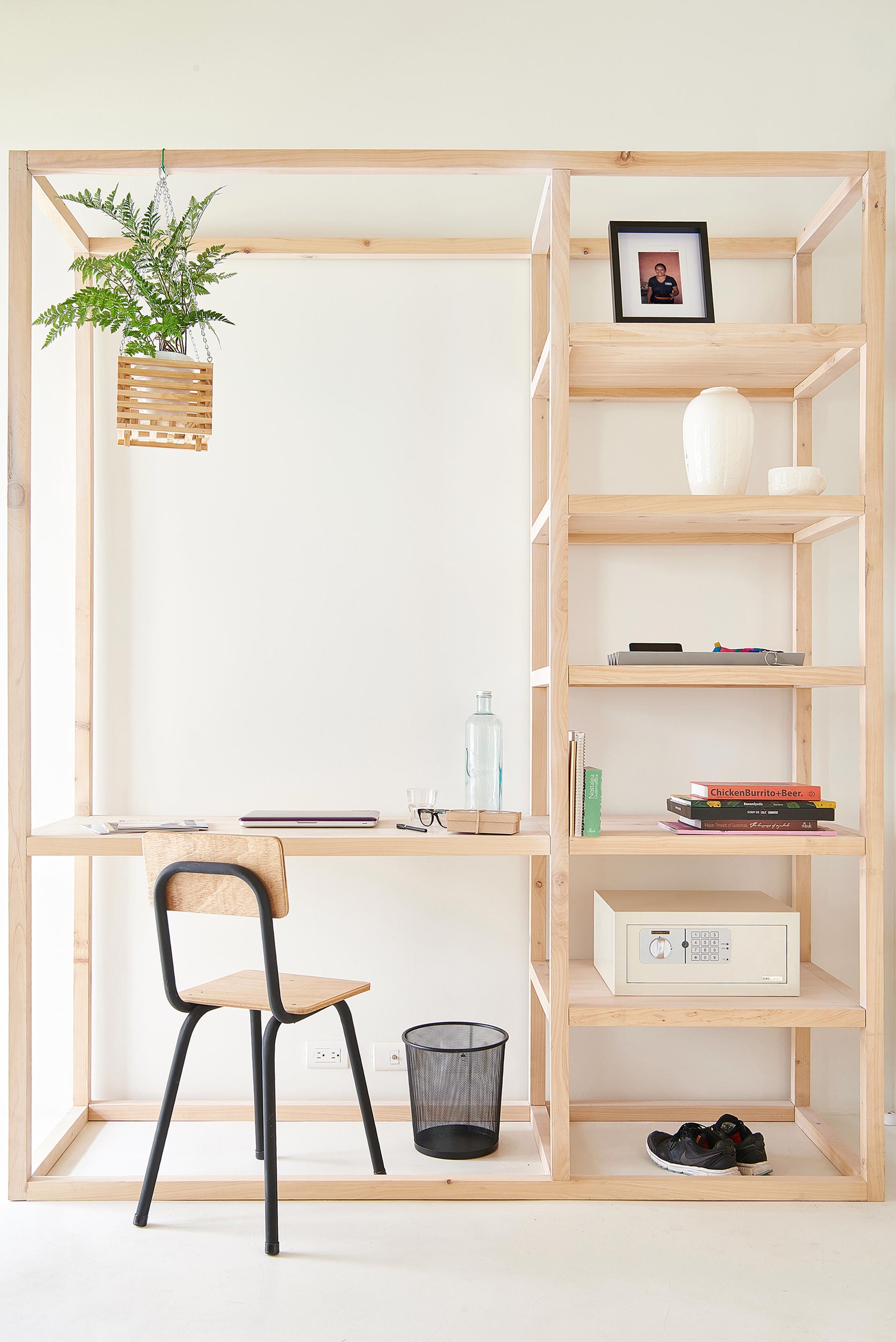 Cabinet / The iconic design of the in-room cabinet with the integrated desk is custom designed for Good Hotel Antigua featuring a hanging plant and accessories from local artists and craftsmen.