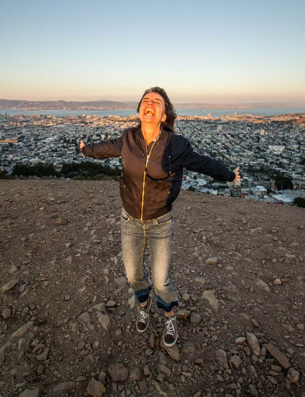 My wife Clare, confidently standing on the top of the world aka as San Francisco's Twin Peaks in 2015. One of my favourite pictures of her. She is taking her space!