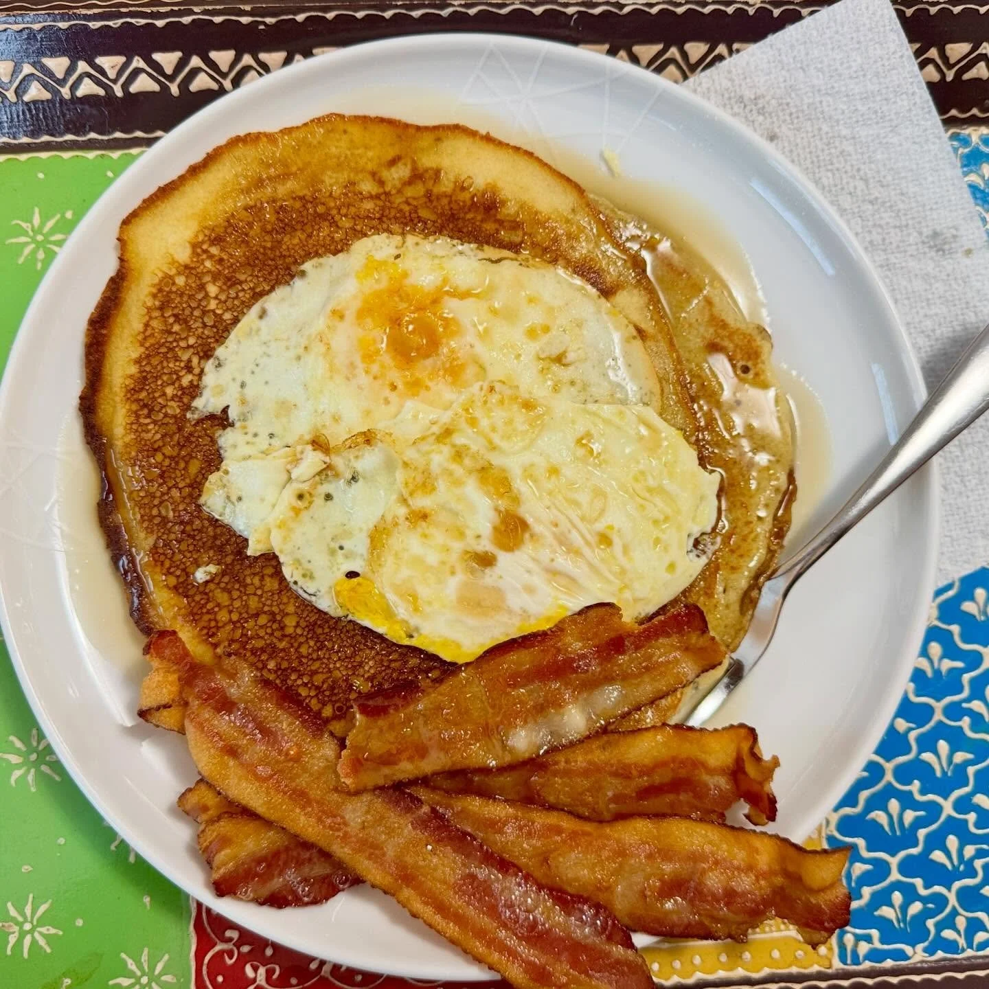 Pancake Day came early for us and was accompanied by bacon, eggs, and maple syrup, American style. 30 minutes later fell into pancake coma. Tonight will be traditional thin pancakes with sugar and lemon. Happy pancake day! #pancakeday