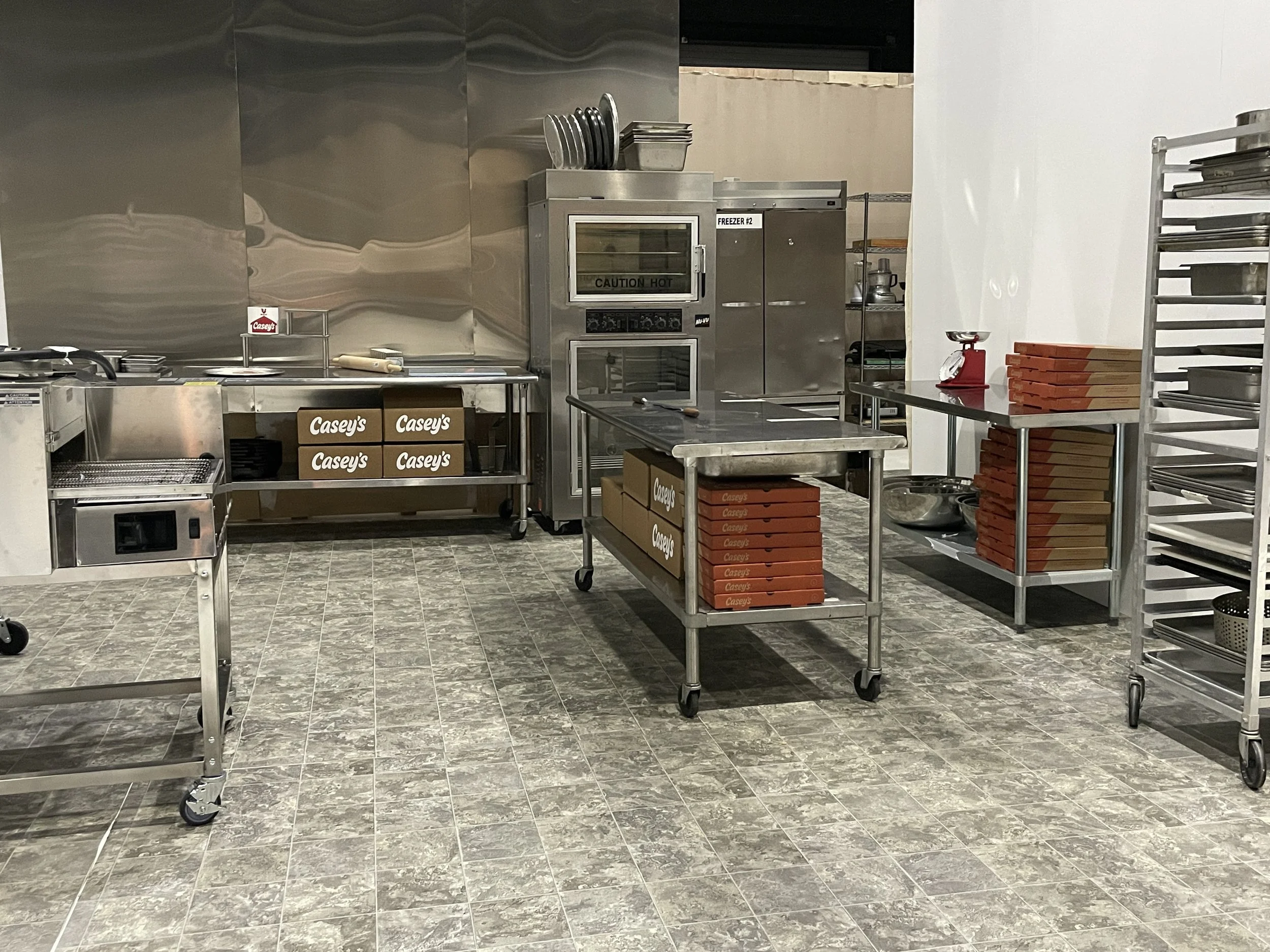 A very simple two wall set done on a tight budget to recreate a Caseys pizza kitchen on a stage.