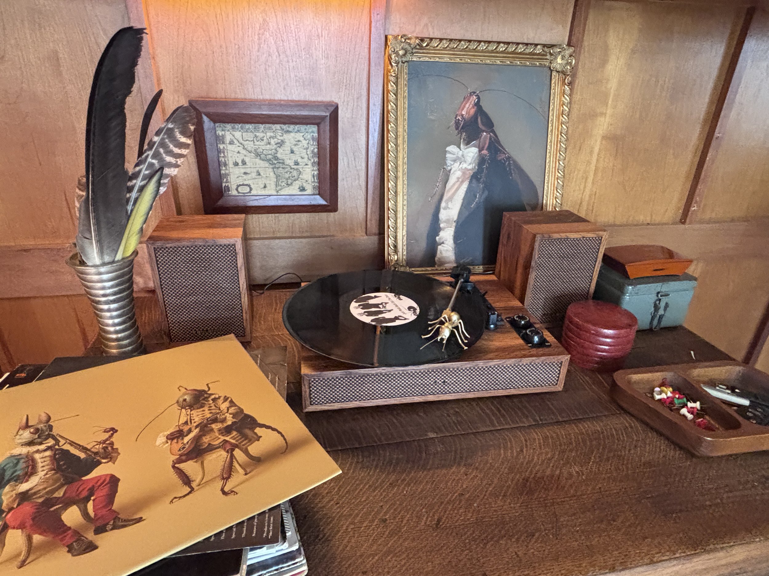 record player with ant needle and fake album cover for Raid