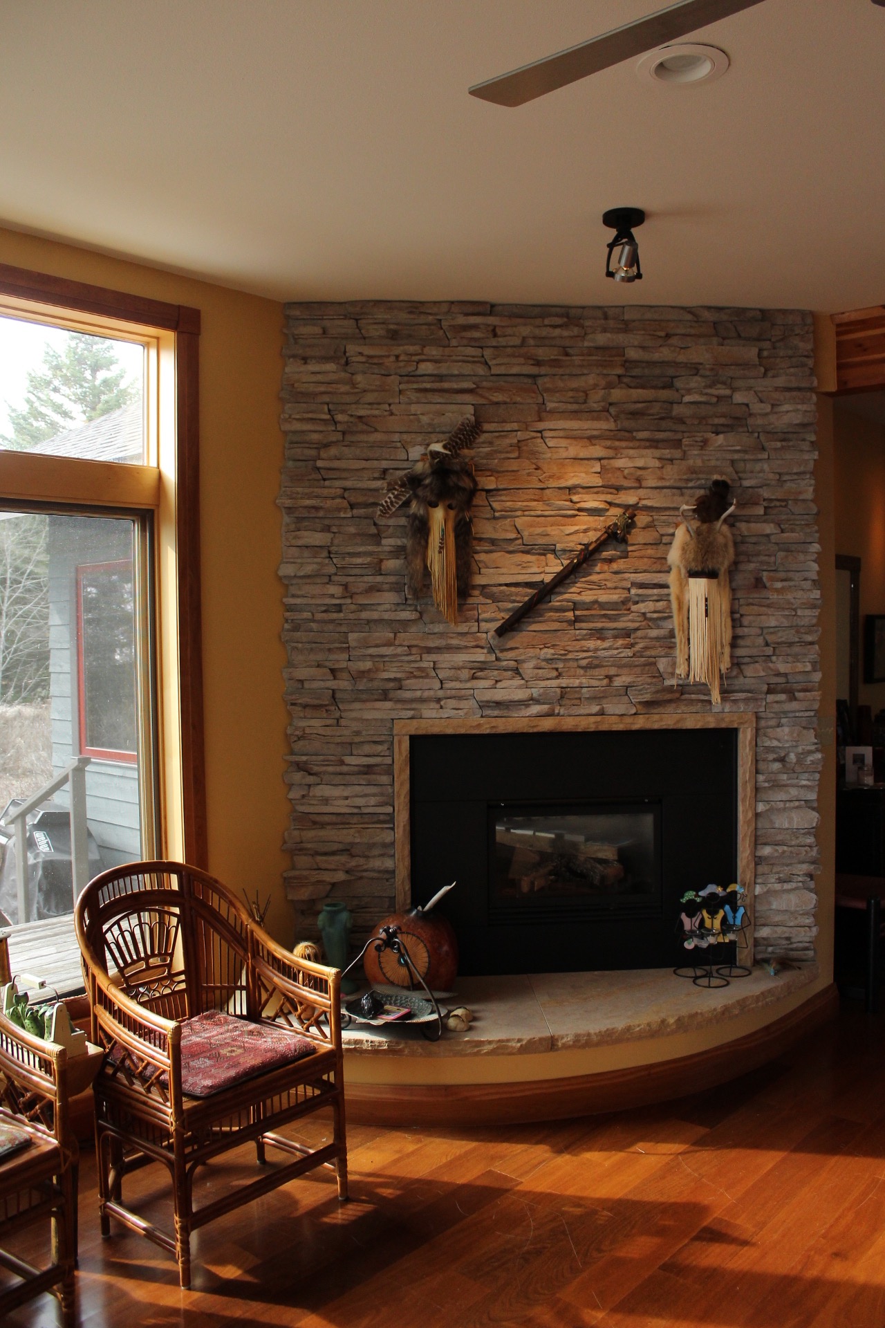 Floor-to-ceiling stone fireplace